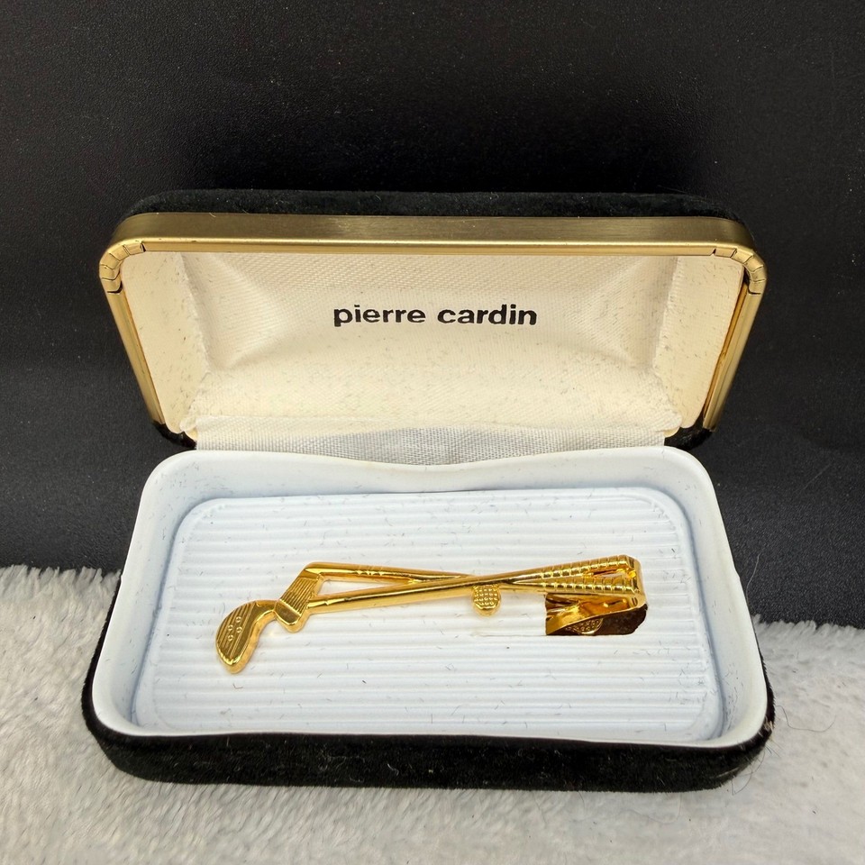 A genuine Pierre Cardin vintage tie bar shaped like golf clubs — designer provenance meets sporty wit in one tiny accessory.