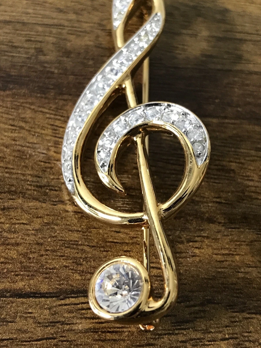 Musical outlet note brooch