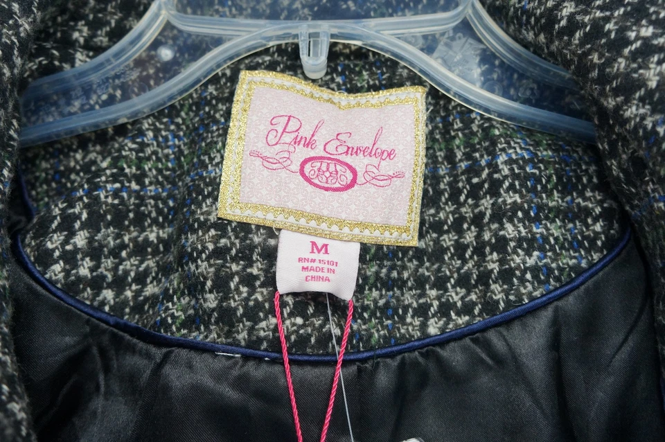 Abrigo/chaqueta mediana a cuadros marrón con palanca talla M en muy buena condición sobre rosa para mujer Foto 2 de 4