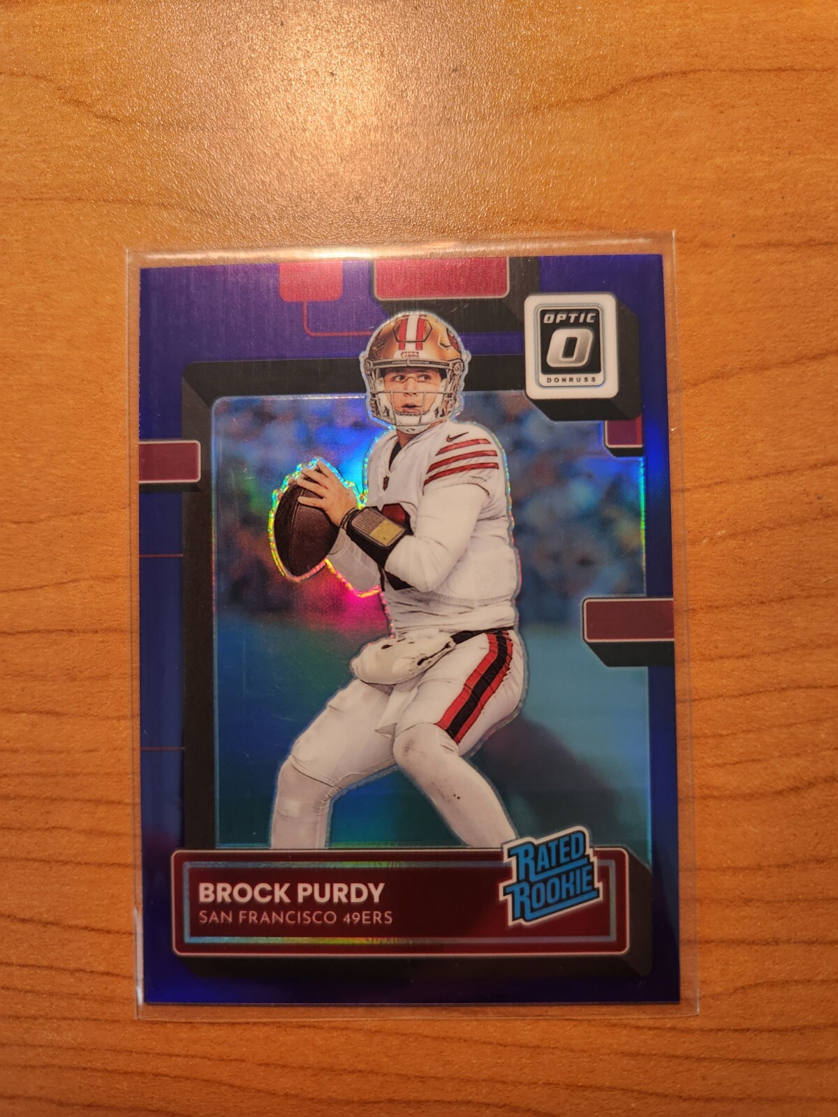 2022 Brock Purdy /50 Panini Donruss Optic - Rated Rookie Purple Prizm #277 (RC)