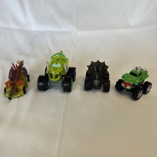 Lot Of 4 Dinosaur Cars Trucks