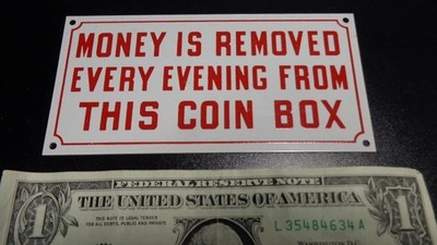 VTG METAL SIGN NOS 2 1/2'' x 5'' MONEY IS REMOVED EVERY EVENING FROM THIS COIN BOX