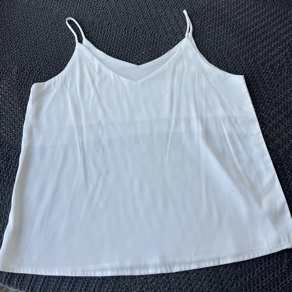 Camiseta sin mangas blanca satinada cuello en V informal cami sin mangas camisola blusas verano sin mangas Foto 3 de 4