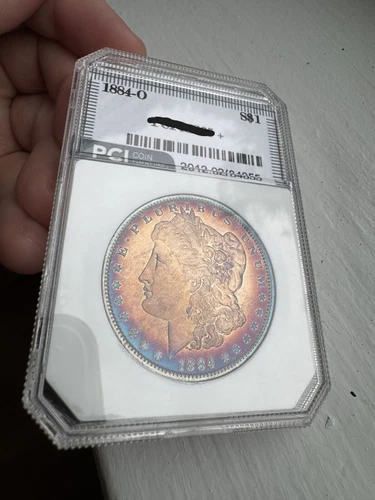 1884 O $1 RAINBOW TONED Morgan Dollar BU++