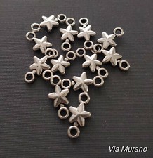 Antique Silver Pewter Star Charm 7x15mm. Pack 12.