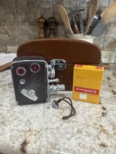BELL HOWELL FILMO AUTO-8, DUAL LENS WITH VINTAGE CASE AND FILM