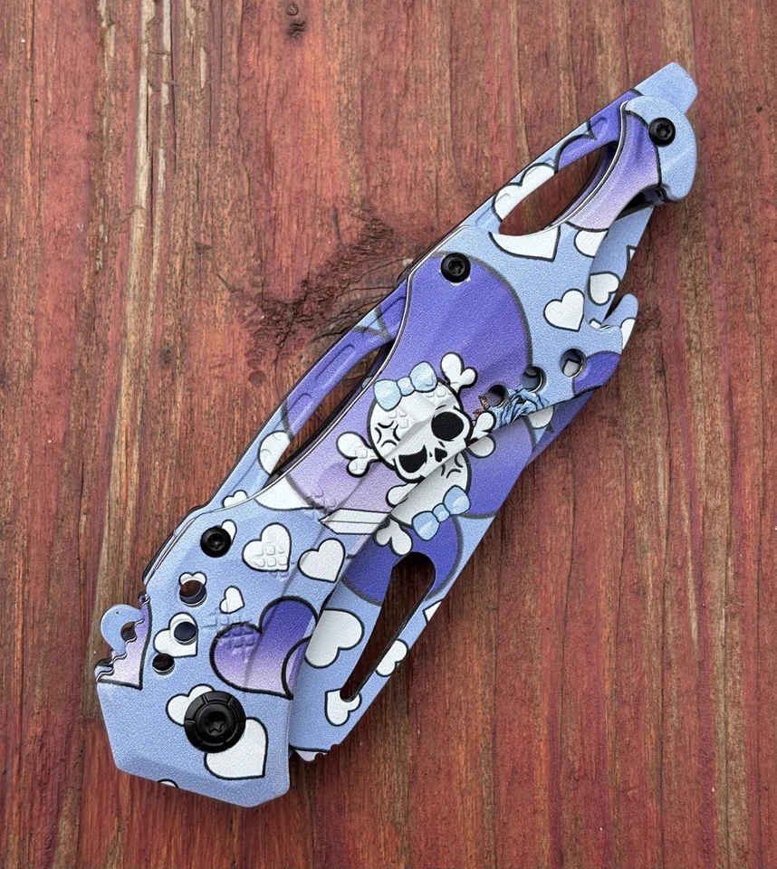 Lindo cuchillo de bolsillo manga púrpura Kuwaii calavera corazón ayuda resorte abridor de botellas Foto 3 de 4
