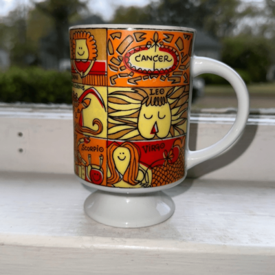 Vintage 60s kitschy orange & yellow Zodiac ceramic coffee cup made