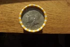 Kennedy half dollar roll with a 40% silver 1966  half on end in vV- good cond.