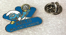 pin's ( tennis Roland Garros et autres) (+ en vente) Abilis SCHTROUMPS argenté