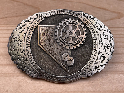 Vintage 1986 Sanchez International Nevada Rotary Metal Belt Buckle Made in USA