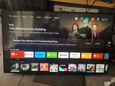 65-in Sony Bravia TV with remote and wall mounting bracket