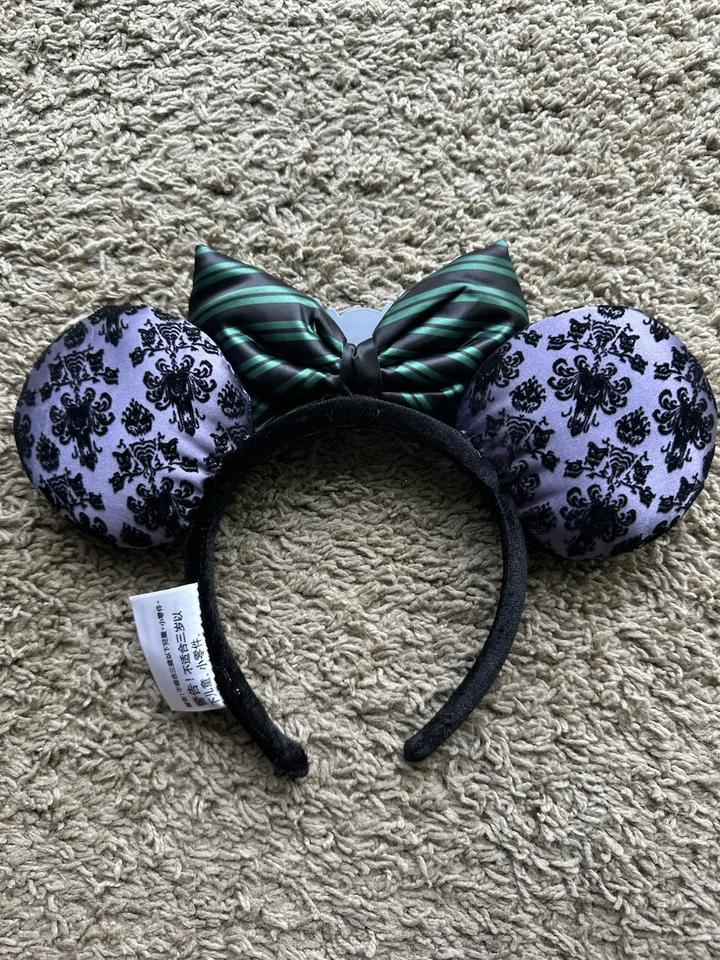 Papel pintado murciélago anfitriona mansión embrujada parque Disney orejas de Minnie diadema Halloween Foto 2 de 2