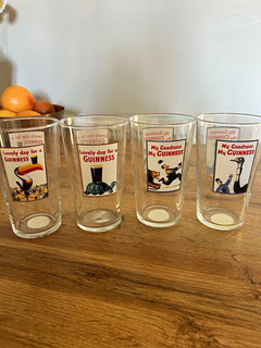 Guinness set of 4 John Gilroy pint glasses