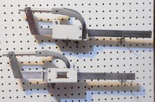 SET  OF GYNO STIRRUPS WITH MOUNTING SLIDE SWIVEL FROM MOBILE STRETCHER