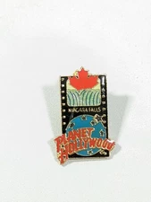 Planet Hollywood Niagara Falls Gold Tone Red Blue Pin 