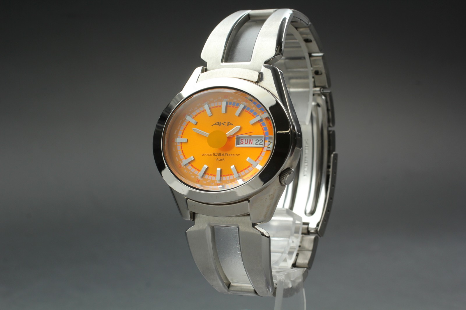 Quartz AKA KANJI Watch Dial ALBA V743-5A10 Orange JAPAN [N MINT] Seiko Day-Date - vintagewatches.pk