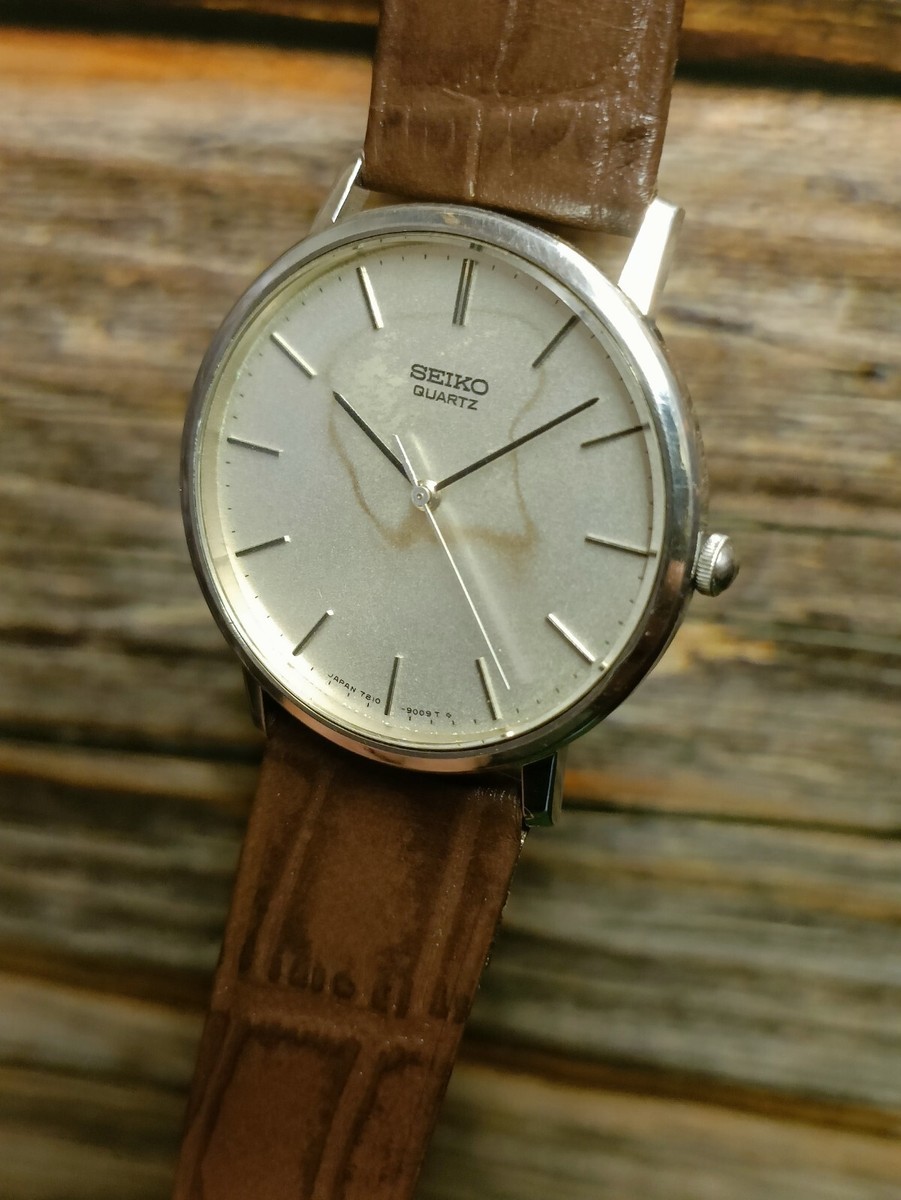VINTAGE SEIKO QUARTZ JAPAN MEN'S SILVER PATINA AGED DIAL