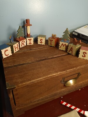 Wooden Blocks Spell Out CHRISTMAS, Held Together By Black Wire, Bendable