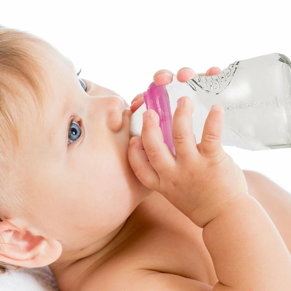 Paquete de 3 botellas de vidrio Munchkin Mighty Grip sin BPA, 4 oz, los colores varían 4 oz. Foto 2 de 4