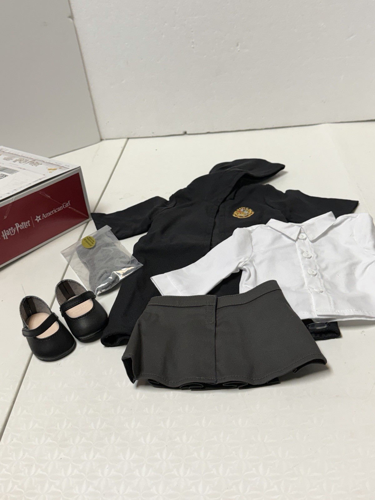 American Girl Harry Potter: Uniforme de Hogwarts con falda nuevo en caja
