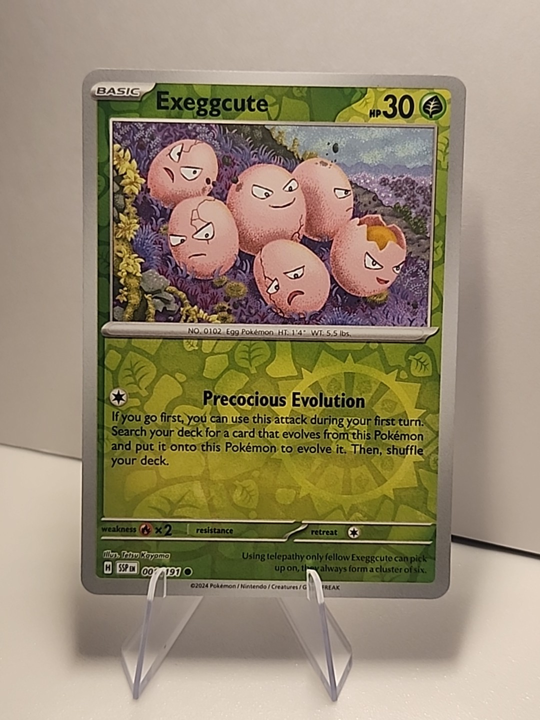 Exeggcute 001/191 Sv08: Surging Sparks Reverse Holo Pokémon TCG NM 