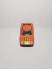 Vintage Matchbox Ferrari Testarossa, 1/59 scale 1986 damaged orange die-cast car