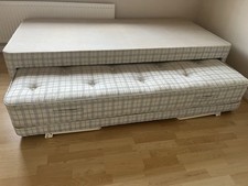 Single bed with pull-out to convert into a double or two singles