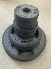 Technogym Olympic Weight Plates Urethane, Bars and Technogym Dumbbells