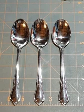 3 Oneidacraft Deluxe CHATEAU pattern stainless place spoons.  