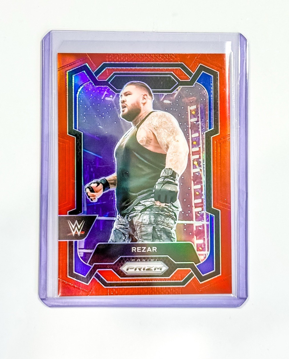 2024 Panini Prizm WWE Rezar Orange Prizm SSP #045/299 AOP SmackDown
