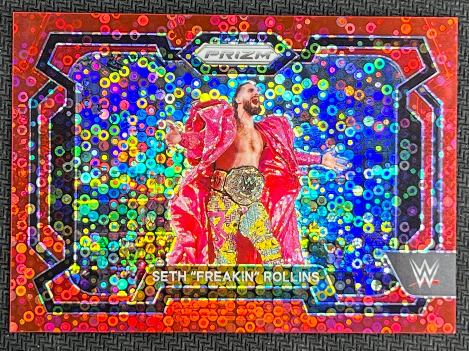 2024 Panini Prizm WWE Red Disco #9 Seth “Freakin” Rollins 89/99