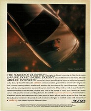 1993 HYUNDAI Elantra cat on hood of car Vintage Print Ad