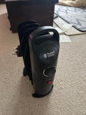 Radiateur rempli d'huile Russell Hobbs 650W (modèle RHOFR3001). Occasion.