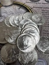 20 brilliant Kennedys or franklins (90%)  $600.00