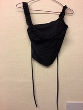 Women’s strappy crop top. Large. Black. Ruffled detailing. Drawstring. BNWT
