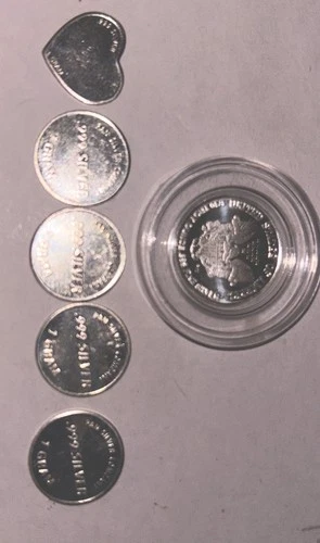 lot of 6 silver bullion-   1 x 1/10 ounce lady liberty and 5x 1 gram silver .999