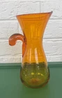 Blenko Glass Pitcher Tangerine Sunburst Orange 9” tall glows under black light