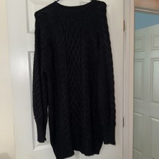 Black thickly woven cotton sweater dress/sweater.