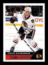 600. 2013-14 score . #101 Niklas Hjalmarsson . Red Back Text Parallel panini PWE