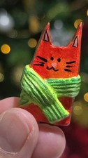 Handmade Orange Cat Pin. Acrylic Painted clay and cured with resin.