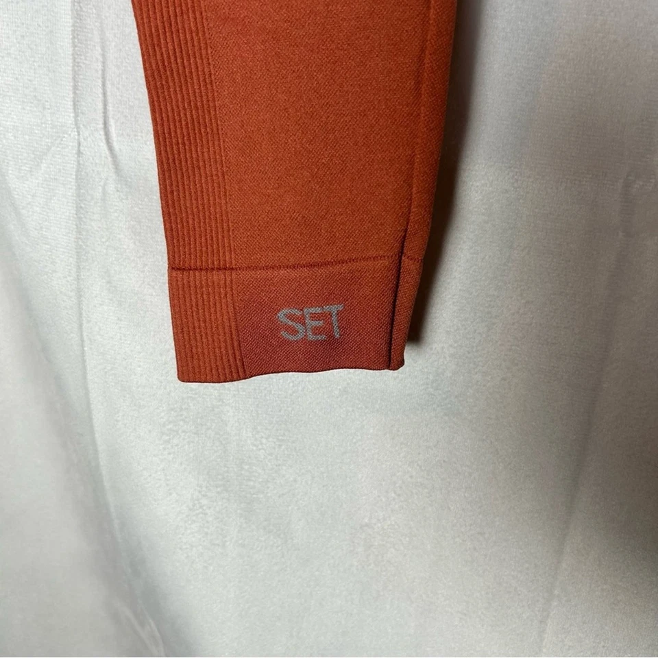 CONJUNTO Leggings Atléticos Yoga Recortados Laterales Acanalados Rosa Salomon Activos Talla Mediana Foto 3 de 4