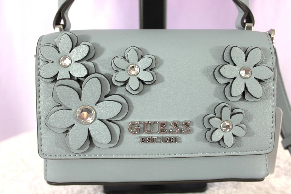 Bandolera Guess Zaria Mini con asa superior - Azul pizarra con apliques florales Foto 2 de 4