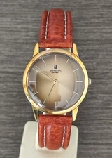 UNIVERSAL GENEVE TIGER EYE DIAL MANUAL WIND *RARE* manual wind