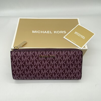 MICHAEL KORS JET SET TRAVEL LARGE THREE QUARTER ZIP WALLET 