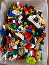 Box full of Legos. hundreds