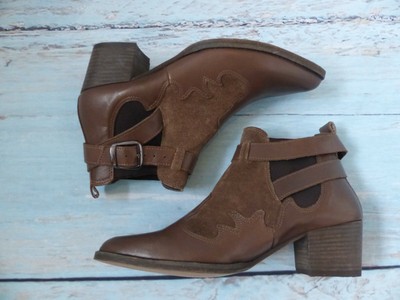brown leather boots with buckles