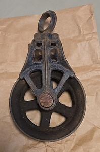 VINTAGE METAL BARN PULLEY--6 INCH WHEEL--WOODEN PEG--SMALL CRACK ON TOP