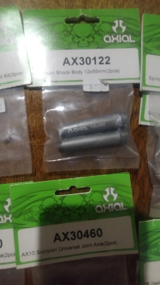 Vintage AXIAL Parts Lot (7 packs + Pair of new Axial Shocks) N.I.P Great Deal - Image 3 of 4