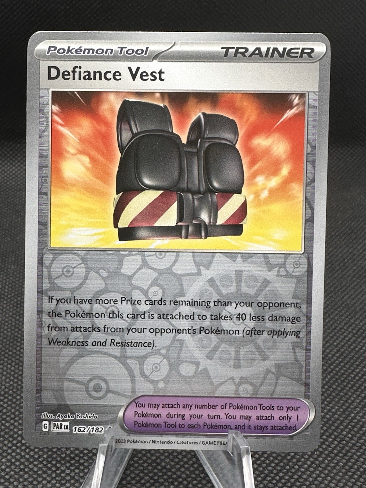 Defiance Vest 162/182 Reverse Holo Pokemon Paradox Rift NM